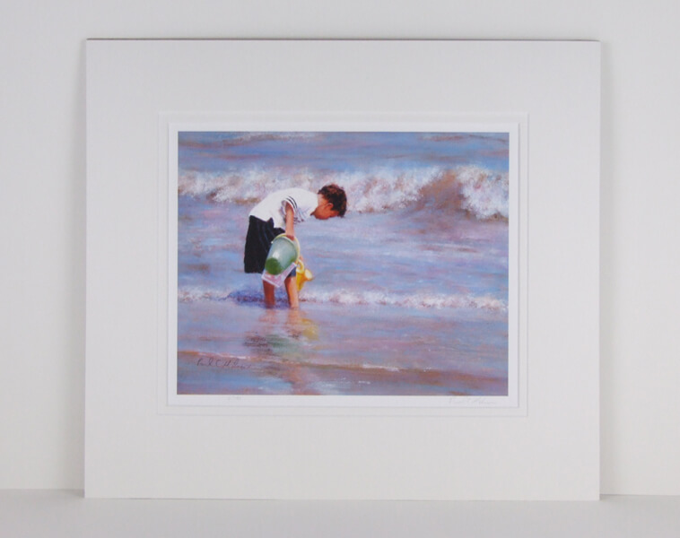 Filling the Pool picture of a boy paddling in the sea by Paul Milner mounted for sale