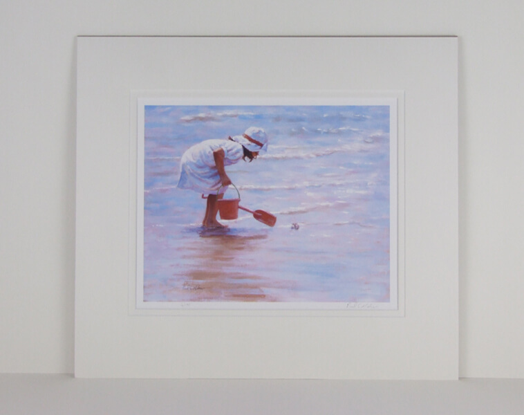 Meeting the Locals picture of a girl playing in the sea by artist Paul Milner mounted for sale